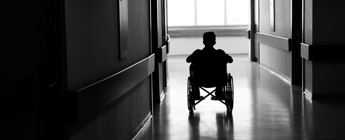 injured man in a wheelchair